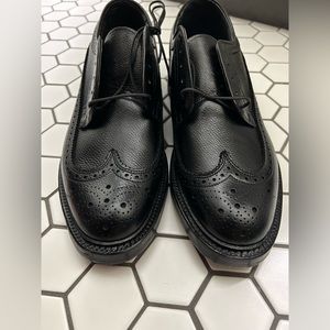 Like new black wing tip dress shoes.